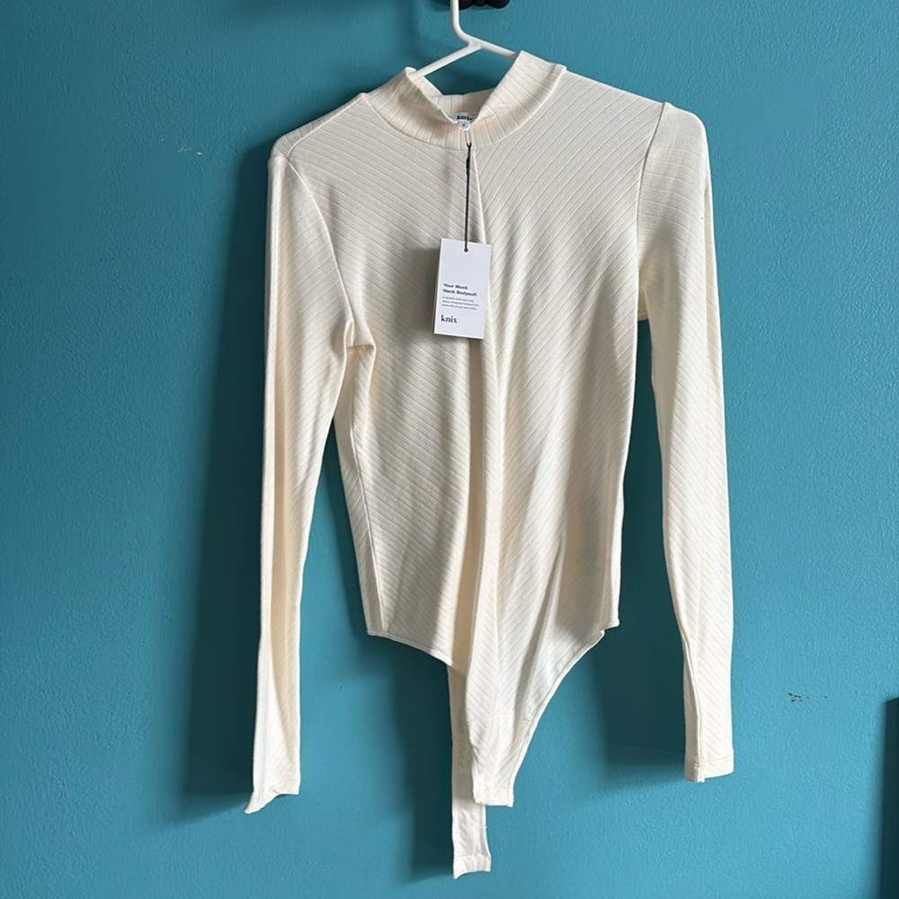 Knix mock neck papaya bodysuit